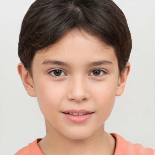 Joyful white child female with short  brown hair and brown eyes