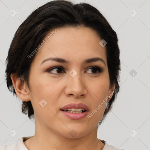 Joyful latino young-adult female with medium  brown hair and brown eyes