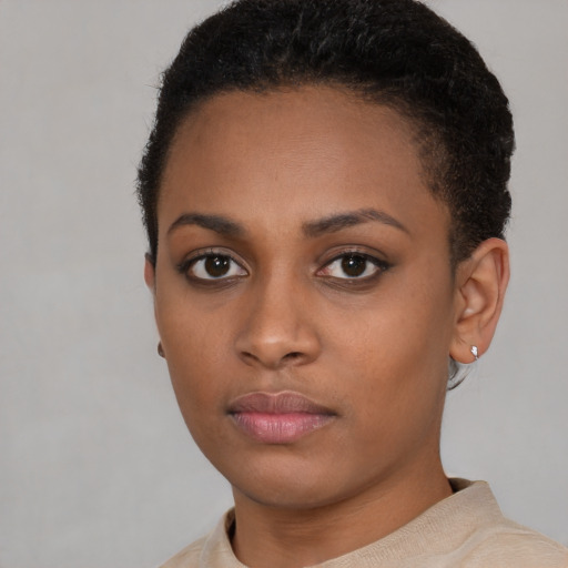 Neutral black young-adult female with short  brown hair and brown eyes