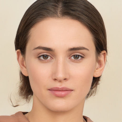 Neutral white young-adult female with medium  brown hair and brown eyes