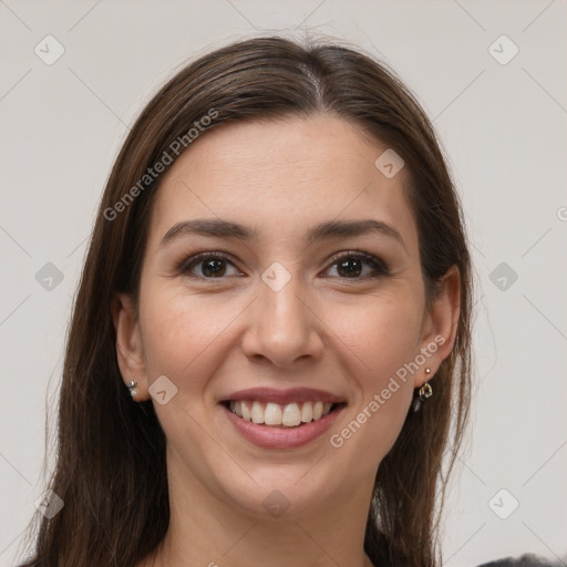 Joyful white young-adult female with long  brown hair and brown eyes