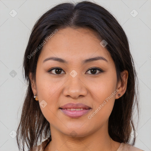 Joyful latino young-adult female with medium  brown hair and brown eyes