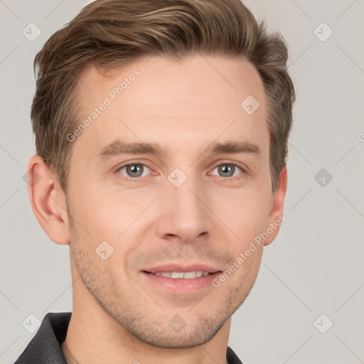 Joyful white young-adult male with short  brown hair and grey eyes