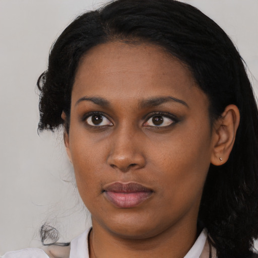 Neutral latino young-adult female with medium  black hair and brown eyes