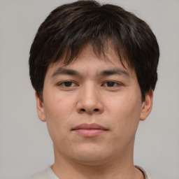 Neutral asian young-adult male with short  brown hair and brown eyes