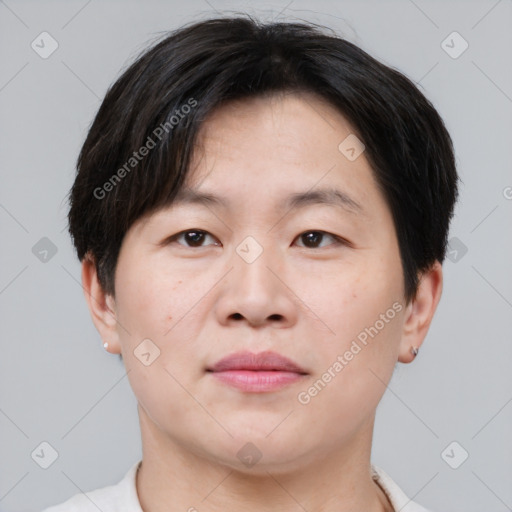 Neutral asian young-adult male with short  brown hair and brown eyes