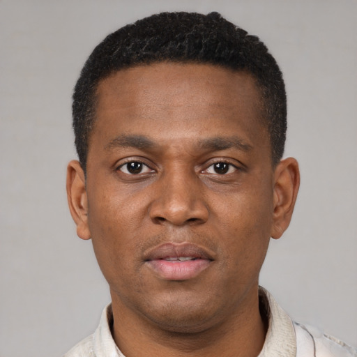 Neutral latino young-adult male with short  brown hair and brown eyes