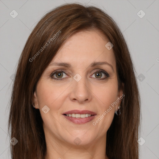 Joyful white adult female with long  brown hair and brown eyes