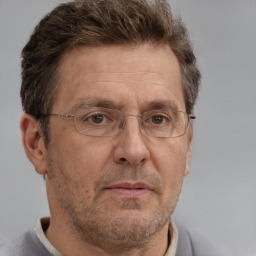 Neutral white middle-aged male with short  brown hair and brown eyes