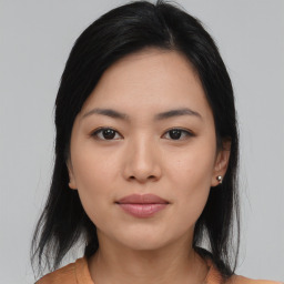 Joyful asian young-adult female with medium  black hair and brown eyes