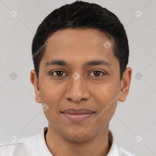 Joyful latino young-adult male with short  black hair and brown eyes