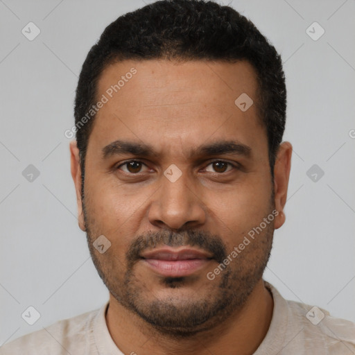 Neutral latino young-adult male with short  black hair and brown eyes