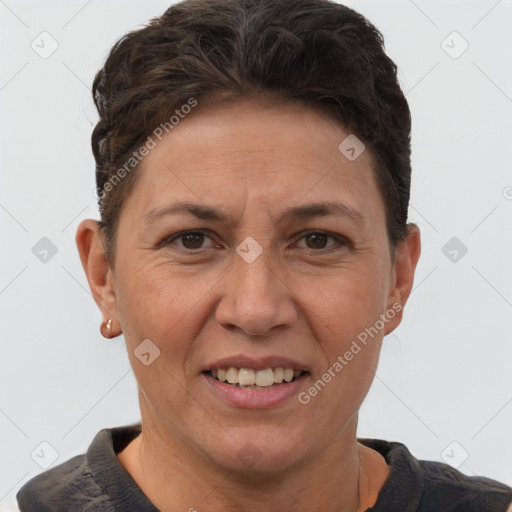 Joyful white adult female with short  brown hair and brown eyes