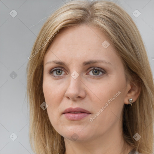 Joyful white adult female with long  brown hair and brown eyes