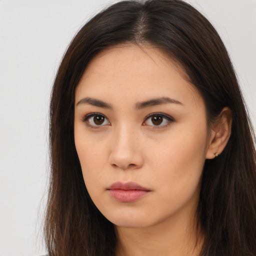 Neutral asian young-adult female with long  brown hair and brown eyes