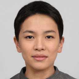 Joyful asian young-adult female with short  black hair and brown eyes