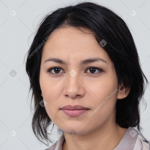 Joyful latino young-adult female with medium  black hair and brown eyes