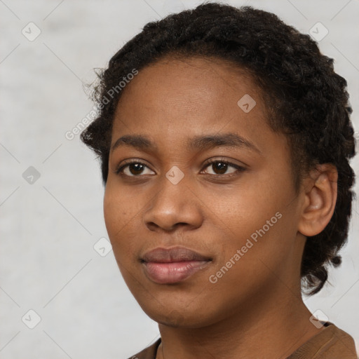 Neutral black young-adult female with short  black hair and brown eyes