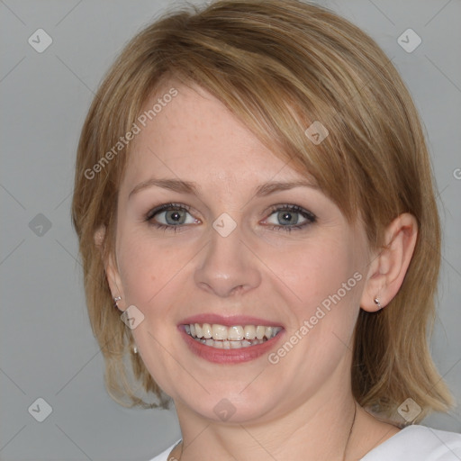 Joyful white young-adult female with medium  brown hair and blue eyes