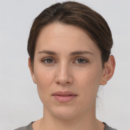 Neutral white young-adult female with short  brown hair and brown eyes