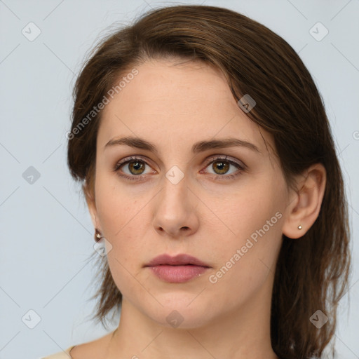 Neutral white young-adult female with medium  brown hair and brown eyes