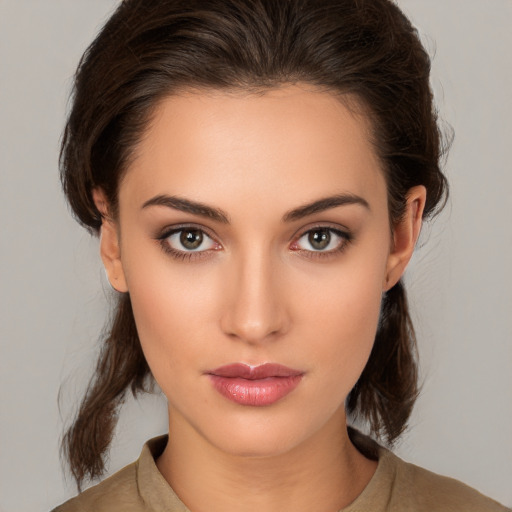 Neutral white young-adult female with medium  brown hair and brown eyes