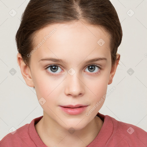 Joyful white child female with short  brown hair and grey eyes