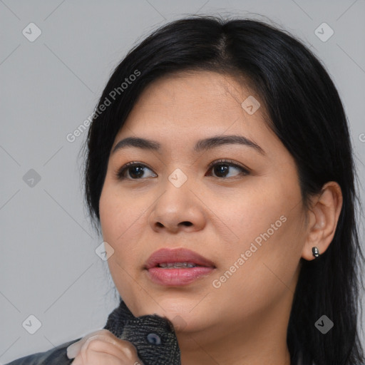 Joyful asian young-adult female with medium  black hair and brown eyes