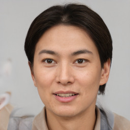 Joyful asian young-adult female with short  brown hair and brown eyes