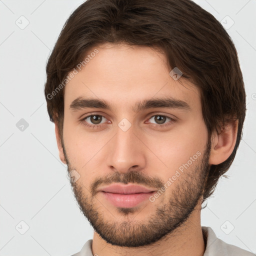 Neutral white young-adult male with short  brown hair and brown eyes