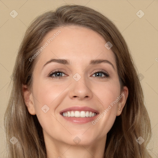 Joyful white young-adult female with long  brown hair and grey eyes