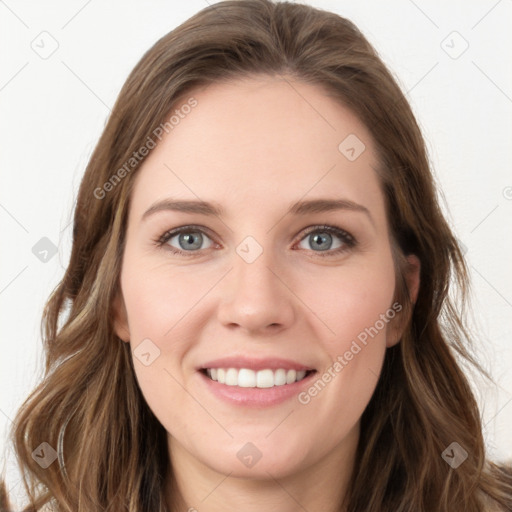 Joyful white young-adult female with long  brown hair and green eyes