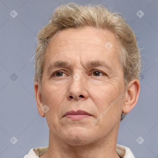 Neutral white middle-aged male with short  brown hair and brown eyes