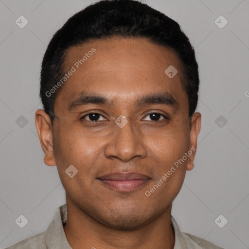 Joyful latino young-adult male with short  black hair and brown eyes