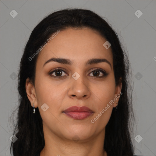 Joyful latino young-adult female with long  brown hair and brown eyes