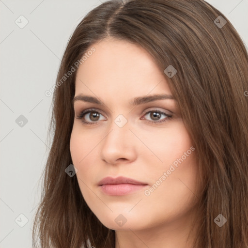 Neutral white young-adult female with long  brown hair and brown eyes