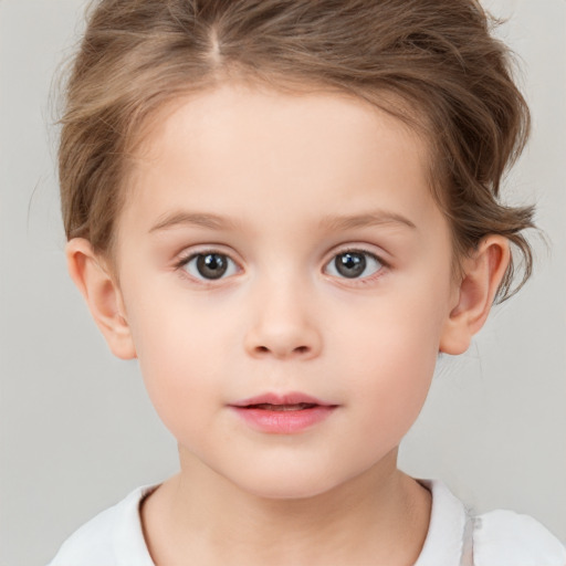 Neutral white child female with short  brown hair and brown eyes