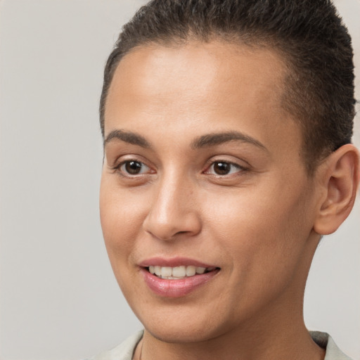 Joyful white young-adult female with short  brown hair and brown eyes