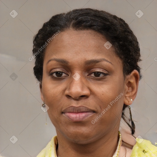 Joyful latino adult female with short  brown hair and brown eyes