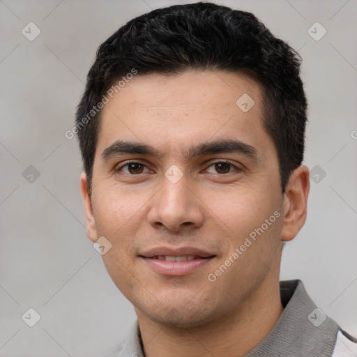 Joyful white young-adult male with short  black hair and brown eyes