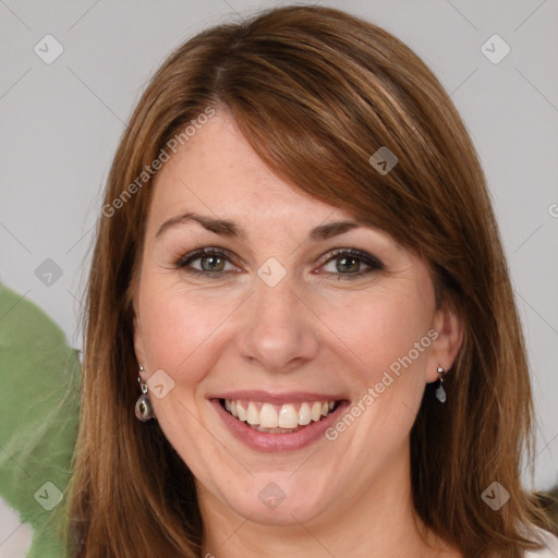 Joyful white young-adult female with long  brown hair and green eyes