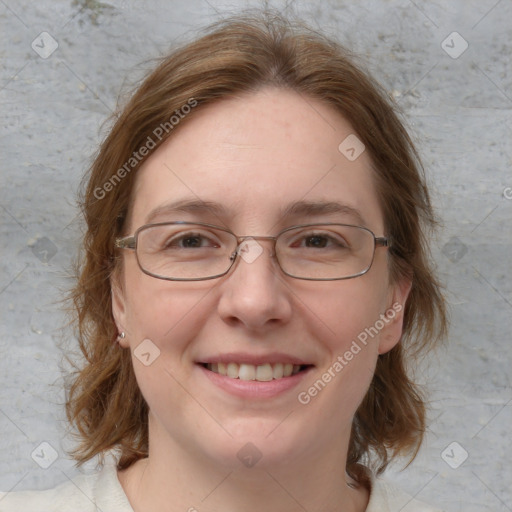 Joyful white adult female with medium  brown hair and blue eyes