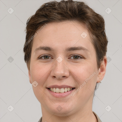 Joyful white young-adult female with short  brown hair and grey eyes