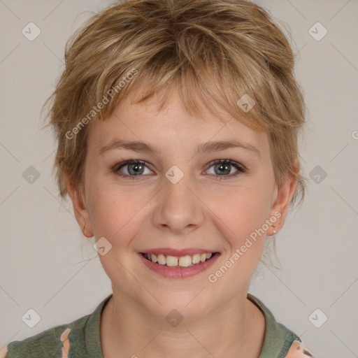 Joyful white young-adult female with medium  brown hair and grey eyes