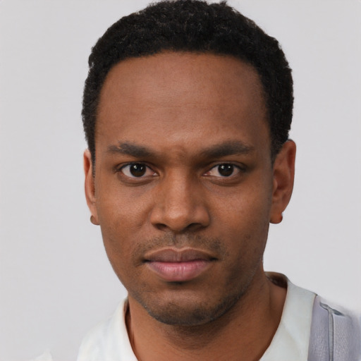 Neutral black young-adult male with short  black hair and brown eyes