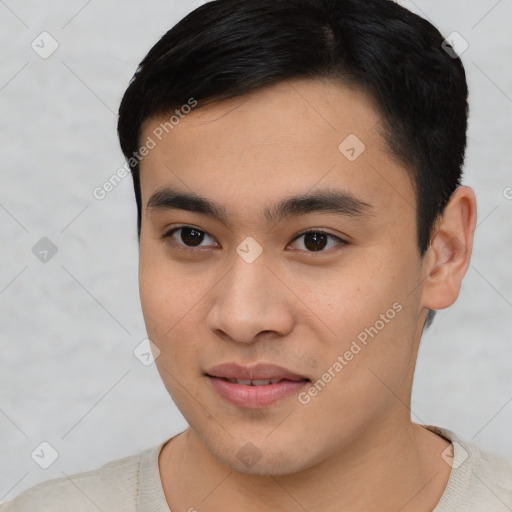 Joyful white young-adult male with short  black hair and brown eyes