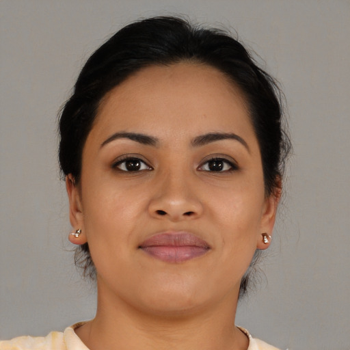 Joyful asian young-adult female with medium  brown hair and brown eyes
