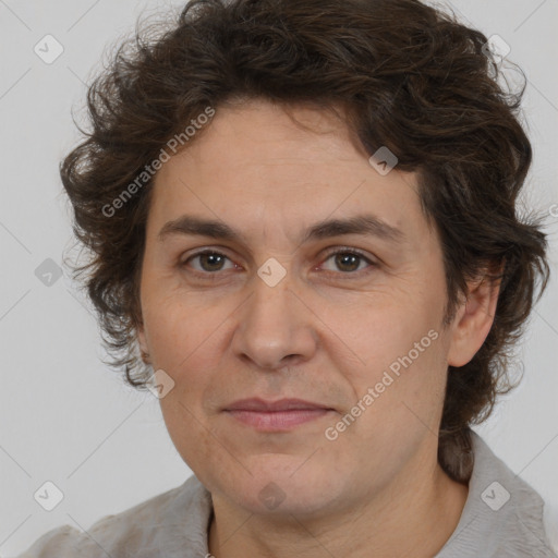 Joyful white adult male with medium  brown hair and brown eyes