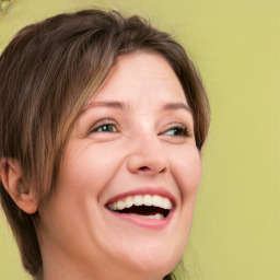 Joyful white adult female with short  brown hair and brown eyes