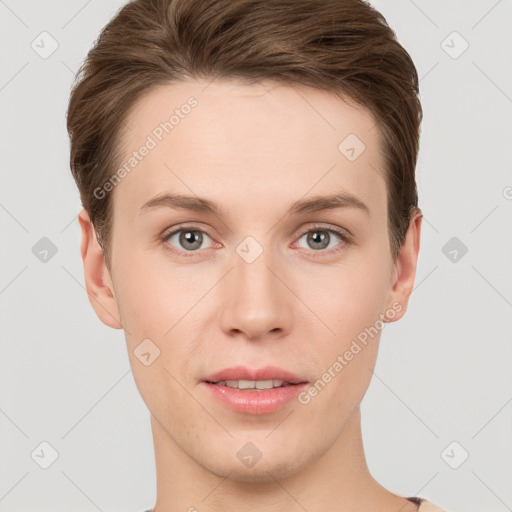 Joyful white young-adult female with short  brown hair and grey eyes